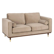 Pezsgőszínű bársonnyal kárpitozott, 2 személyes kanapé.