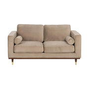 Pezsgőszínű bársonnyal kárpitozott, 2 személyes kanapé.