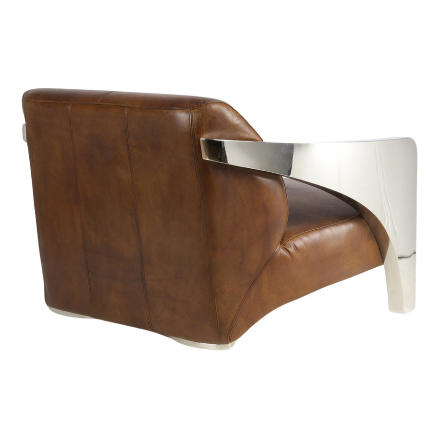 LE RUTILANT 2 személyes kanapé hátsó nézete, amelyen jól látható a természetes marhabőr textúrája.