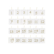 Antik fehér színű paraffinból készült, aranyszínű számokkal díszített, kocka formájú, 24 db-os adventi gyertya szett.