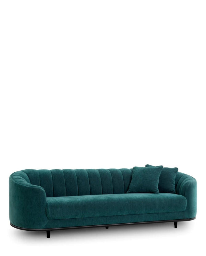 Tengerzöld színű szövettel kárpitozott, 3 személyes dizájn kanapé.