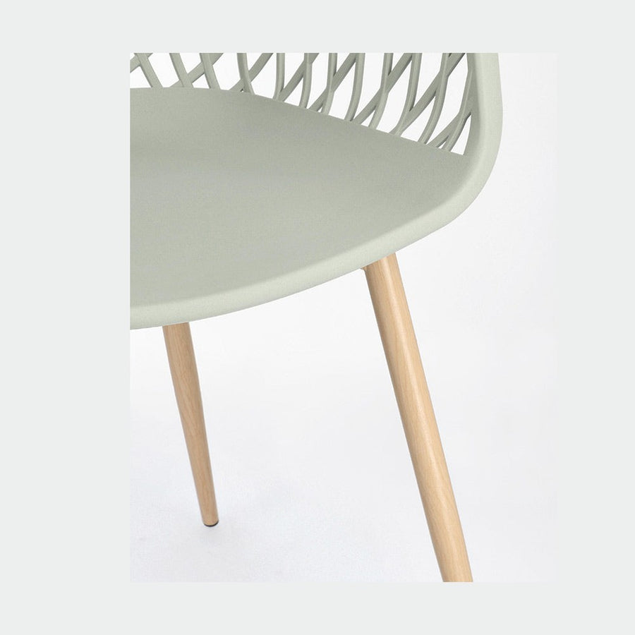 Zöld színű műanyag étkezőszék.