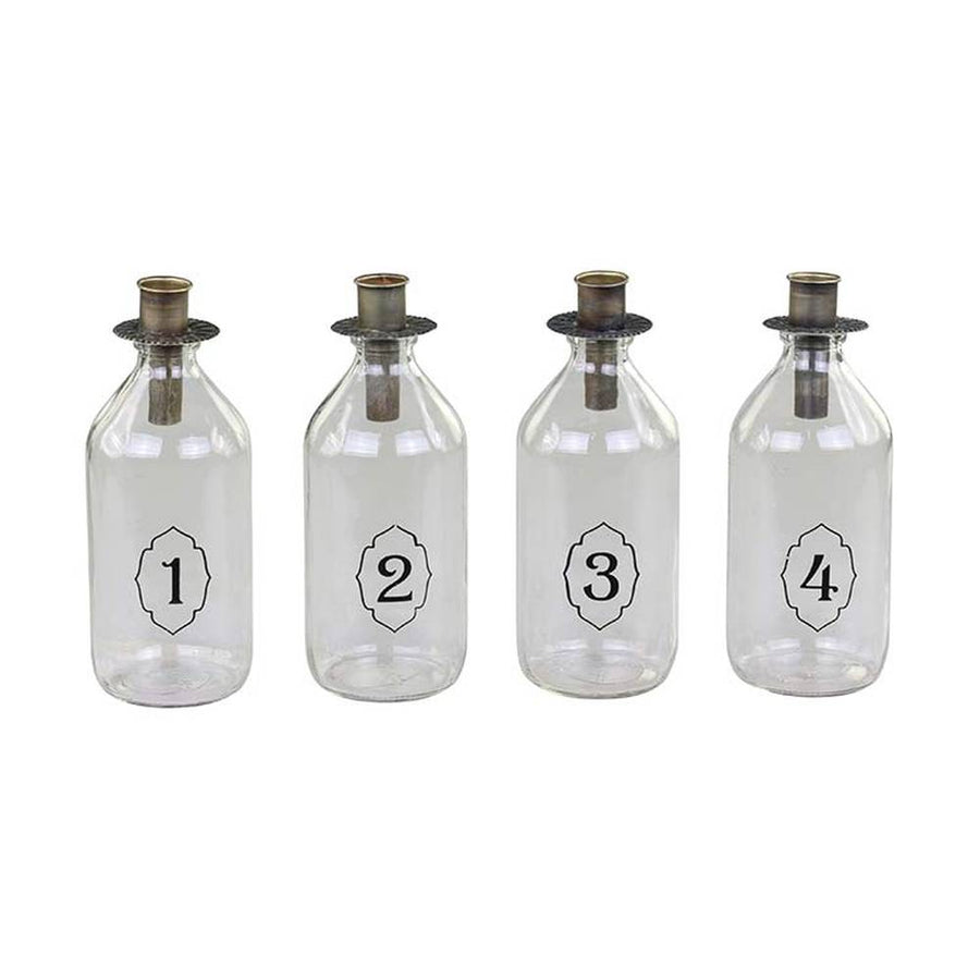 4 darabos, számozott díszítésű üvegpalackba kialakított adventi gyertyatartó szett.