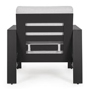 A kortárs stílusú, fekte-fehér színű ülőgarnitúra fotel tagja.