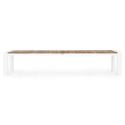 Óriás méretű, bővíthető, fehér színű alumínium étkezőasztal natúr színű teakfa fedlappal.