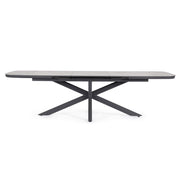 Kortárs, grafitszürke színű, alumíniumvázas, bővíthető kültéri étkezőasztal szinterezett kő fedlappal.