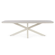 Kortárs, bézs színű, alumíniumvázzal rendelkező kültéri étkezőasztal szinterezett kő fedlappal.