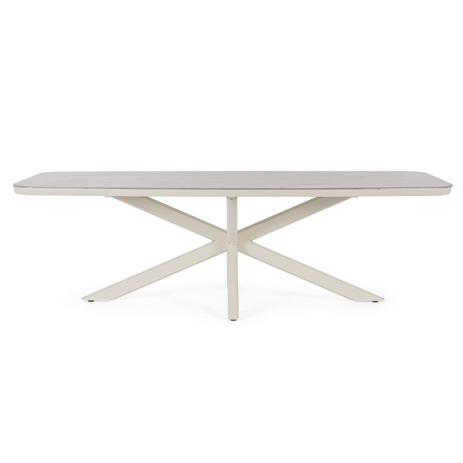 Kortárs, bézs színű, alumíniumvázzal rendelkező kültéri étkezőasztal szinterezett kő fedlappal.