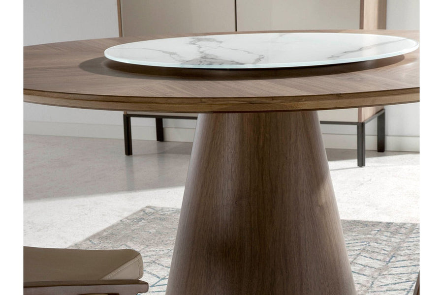 Kortárs stílusú, diófa furnérral borított, dizájn étkezőasztal forgatható porcelán betéttel.