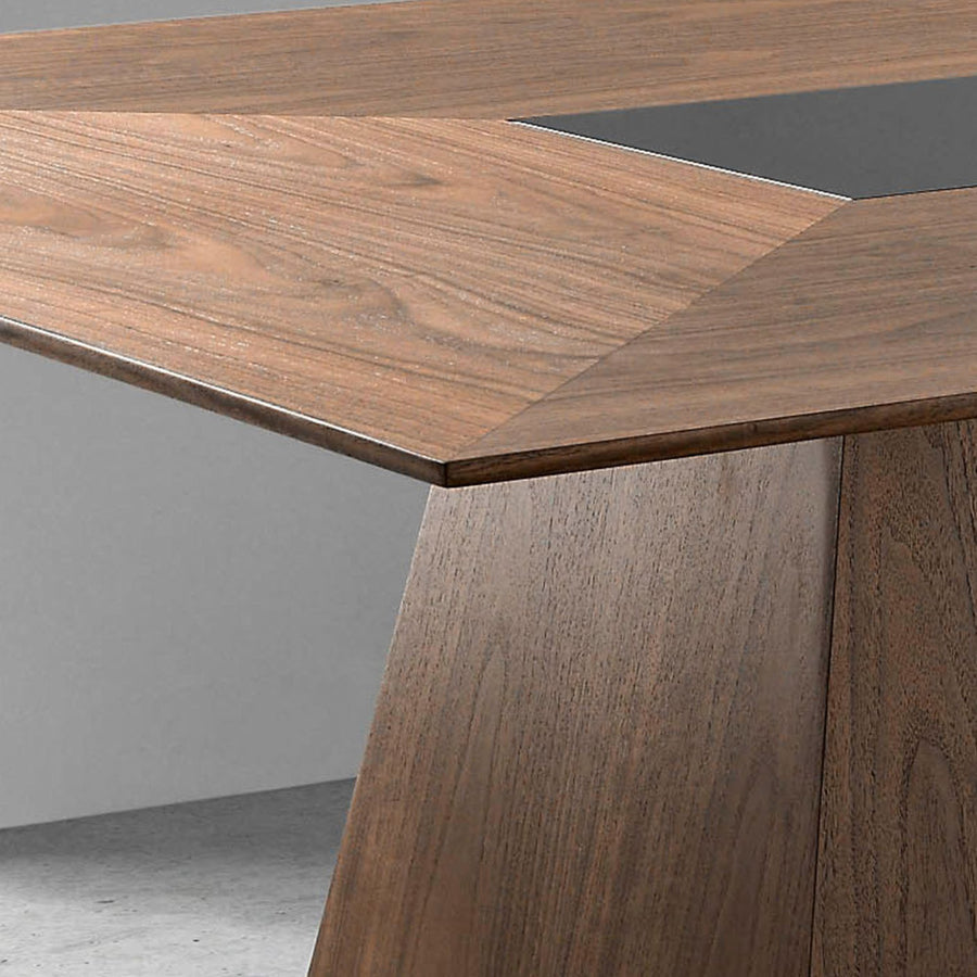 Kortárs stílusú, diófa furnérral borított, formatervezett, étkezőasztal üvegbetéttel.