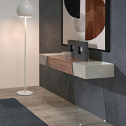 Kortárs stílusú, diófa furnérral borított, dizájn konzolasztal edzett üveg lábakkal.