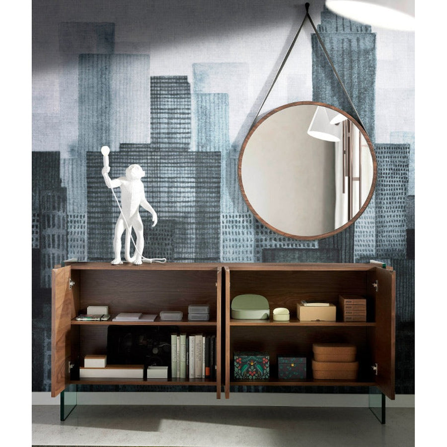 Kortárs, diófa furnérral borított, dizájn komódszekrény edzett üveg lábakkal.