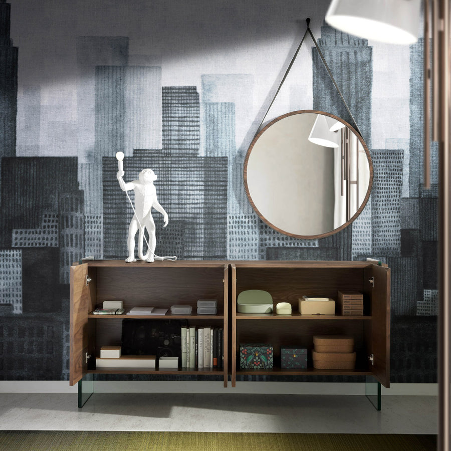 Kortárs, diófa furnérral borított, dizájn komódszekrény edzett üveg lábakkal.