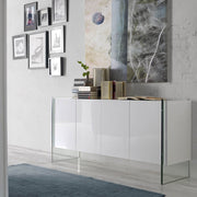 Kortárs stílusú, magasfényű, fehér színű lakkal festett, dizájn komódszekrény edzett üveg lábakkal.