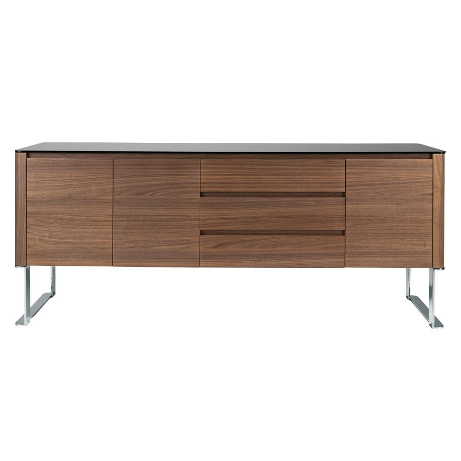 Kortárs stílusú, diófa furnérral borított, dizájn komódszekrény fekete edzett üveg fedlappal.