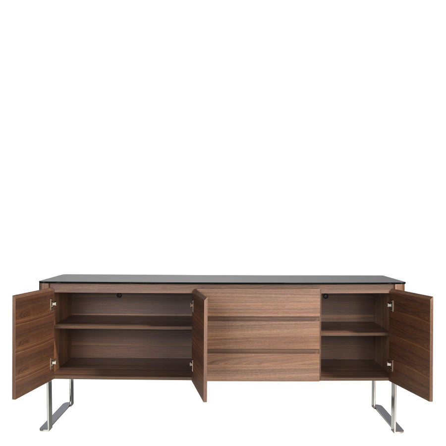 Kortárs stílusú, diófa furnérral borított, dizájn komódszekrény fekete edzett üveg fedlappal.