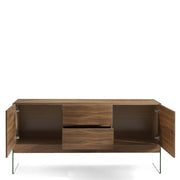 Kortárs stílusú, diófa furnérral borított, dizájn komódszekrény edzett üveg lábakkal.