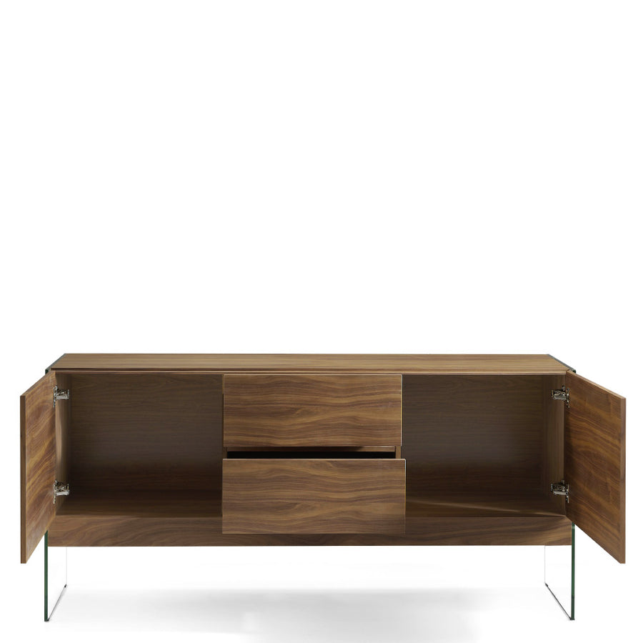 Kortárs stílusú, diófa furnérral borított, dizájn komódszekrény edzett üveg lábakkal.