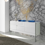 Kortárs stílusú,magasfényű, fehér lakkal festett, dizájn komódszekrény edzett üveg lábakkal.