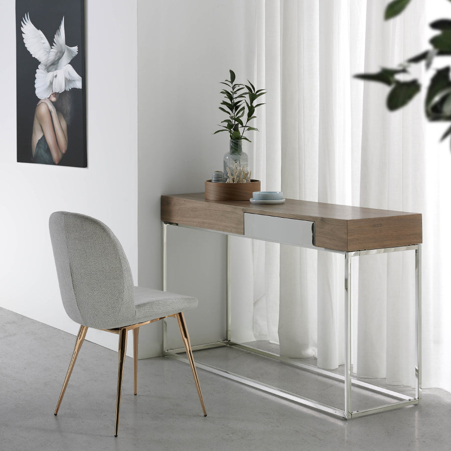 Kortárs stílusú, diófa furnérral borított, dizájn konzolasztal rozsdamentes acél lábakkal.