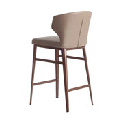 Kortárs stílusú, bézs műbőrrel kárpitozott, matt bronzszínű fémvázas dizájn bárszék.