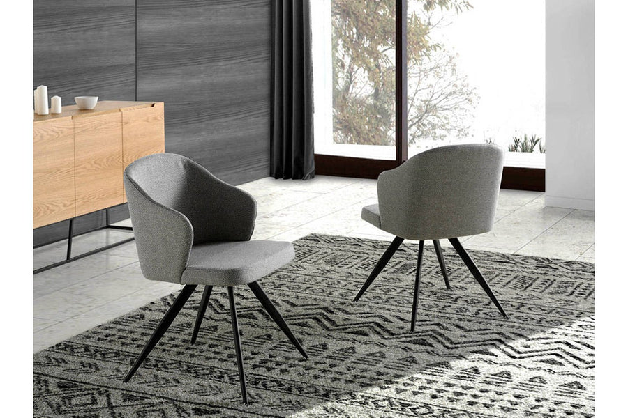 Kortárs stílusú, szürke színű szövettel kárpitozott, acél szerkezetű étkezőszék.