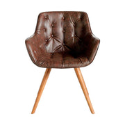 Barna műbőrrel kárpitozott, kőrisfából készült, formatervezett dizájn étkezőszék.