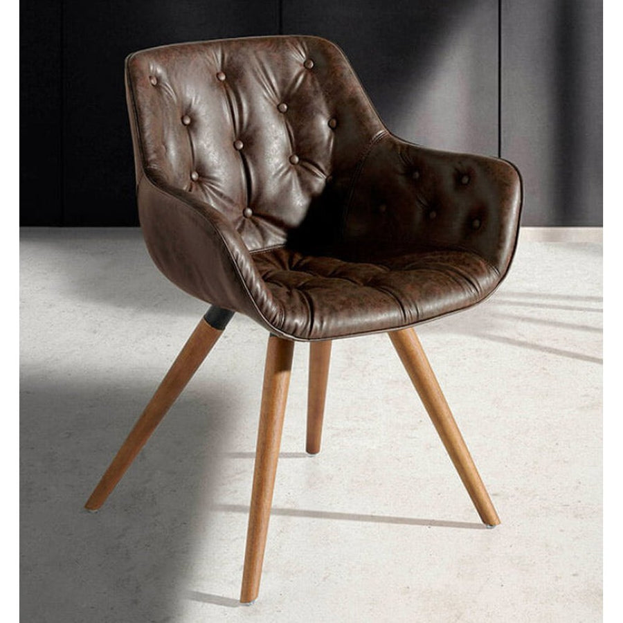 Barna műbőrrel kárpitozott, kőrisfából készült, formatervezett dizájn étkezőszék.