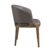 Szürkésbarna műbőrrel kárpitozott, kőrisfából készült, formatervezett dizájn étkezőszék.