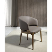 Szürkésbarna műbőrrel kárpitozott, kőrisfából készült, formatervezett dizájn étkezőszék.