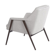 Kortárs stílusú, törtfehér színű szövettel kárpitozott, acél szerkezetű fotel.