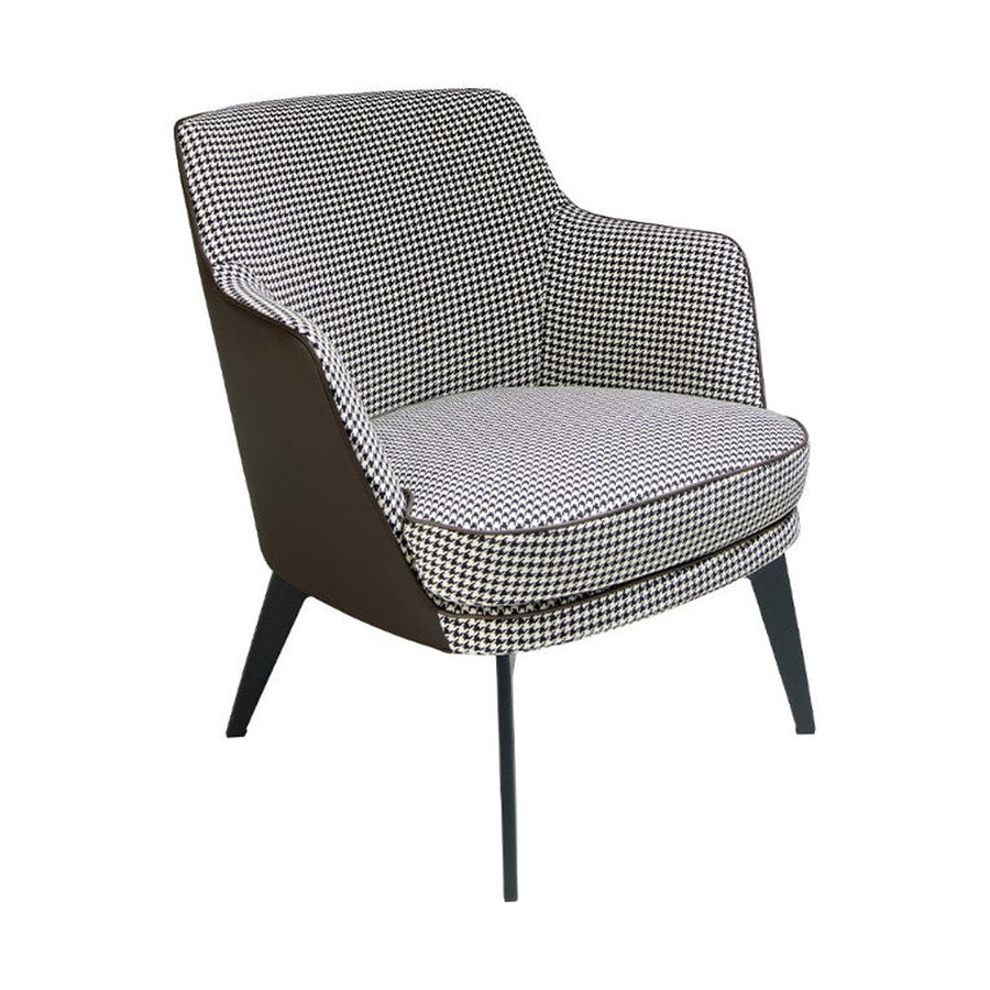 Kortárs stílusú, fekete színű műbőrrel és pepita színű szövettel kárpitozott dizájn fotel.