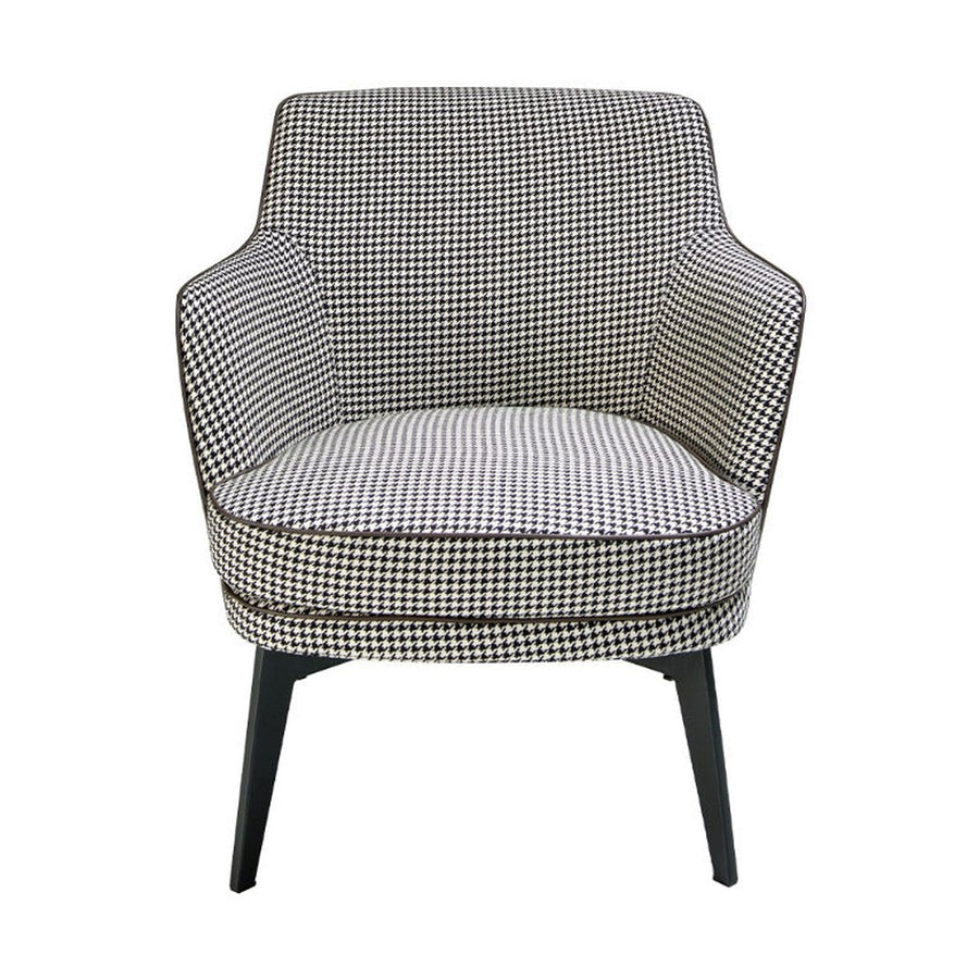 Kortárs stílusú, fekete színű műbőrrel és pepita színű szövettel kárpitozott dizájn fotel.