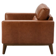 Kortárs stílusú, dohánybarna bőrrel kárpitozott, dizájn fotel diófa lábakkal.