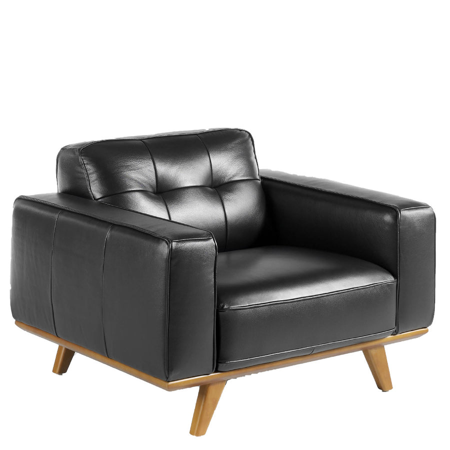 Kortárs stílusú, fekete bőrrel kárpitozott, dizájn fotel diófa lábakkal.