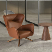 Kortárs stílusú, barna színű műbőrrel kárpitozott, forgatható, dizájn pihenőfotel