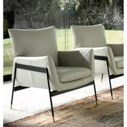 Kortárs stílusú, törtfehér színű, bőr dizájn fotel. acél szerkezettel