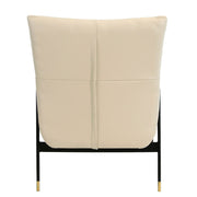 Angel Cerdá bőrfotel hátulnézet aranyszínű lábvégződésekkel