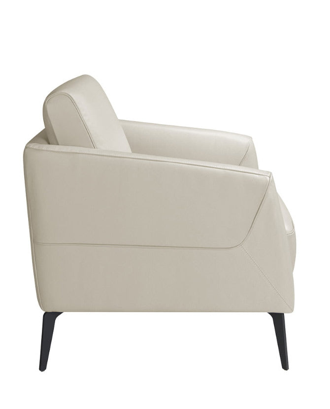 Kortárs stílusú, krémszínű bőrrel kárpitozott, acél szerkezetű dizájn fotel.