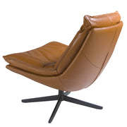 Kortárs stílusú,barna bőrrel kárpitozott, forgatható, dizájn pihenőfotel fekete színű acéllábakkal.
