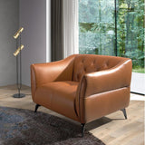 Angel Cerdá agyagbarna bőrfotel modern nappaliban