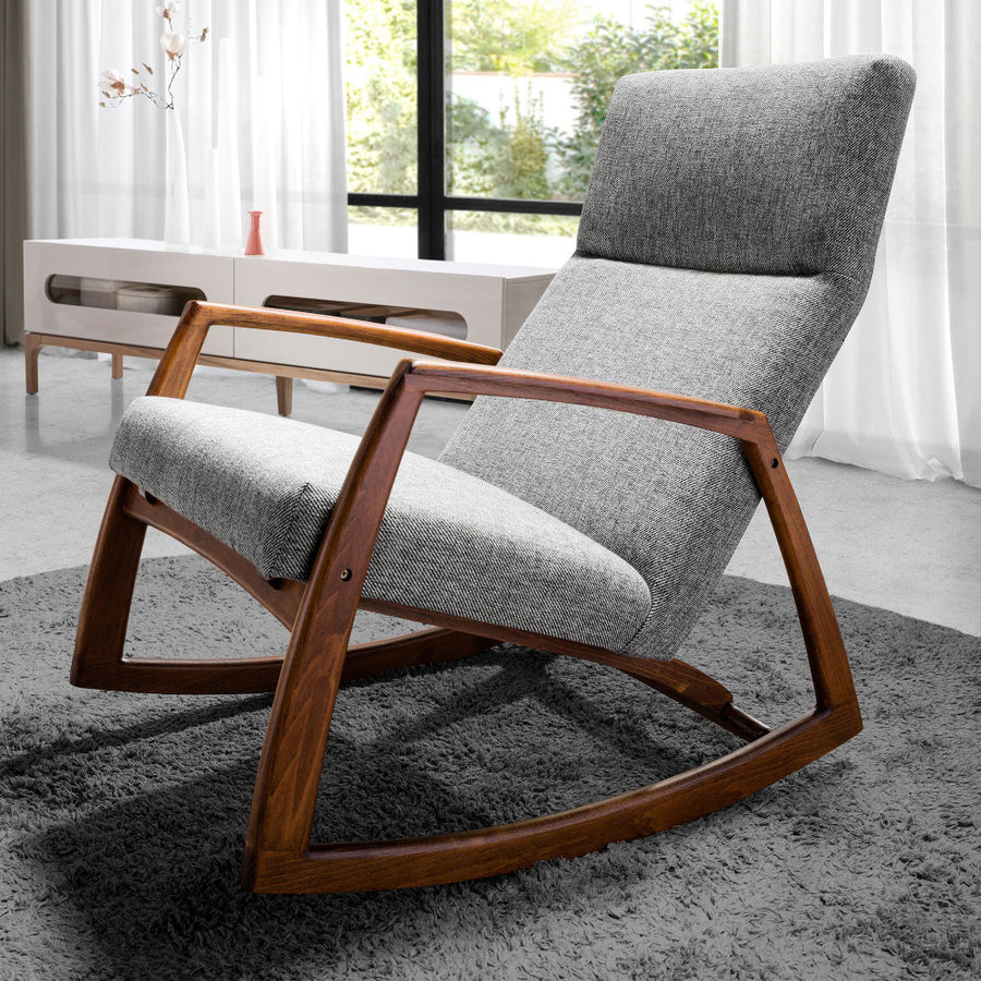 Kortárs stílusú, szürke színű szövettel kárpitozott hintaszék.