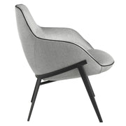 Kortárs stílusú, szürke színű szövettel kárpitozott, acélszerkezetű dizájn fotel.