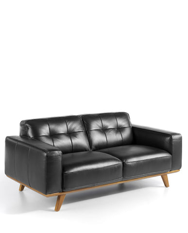 Kortárs stílusú, fekete színű bőrrel kárpitozott,  fenyőfaszerkezetes, dizájn kanapé.