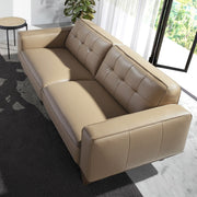 Kortárs, homokszínű bőrrel kárpitozott, fenyőfaszerkezetes, dizájn kanapé.