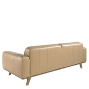 Kortárs, homokszínű bőrrel kárpitozott, fenyőfaszerkezetes, dizájn kanapé.