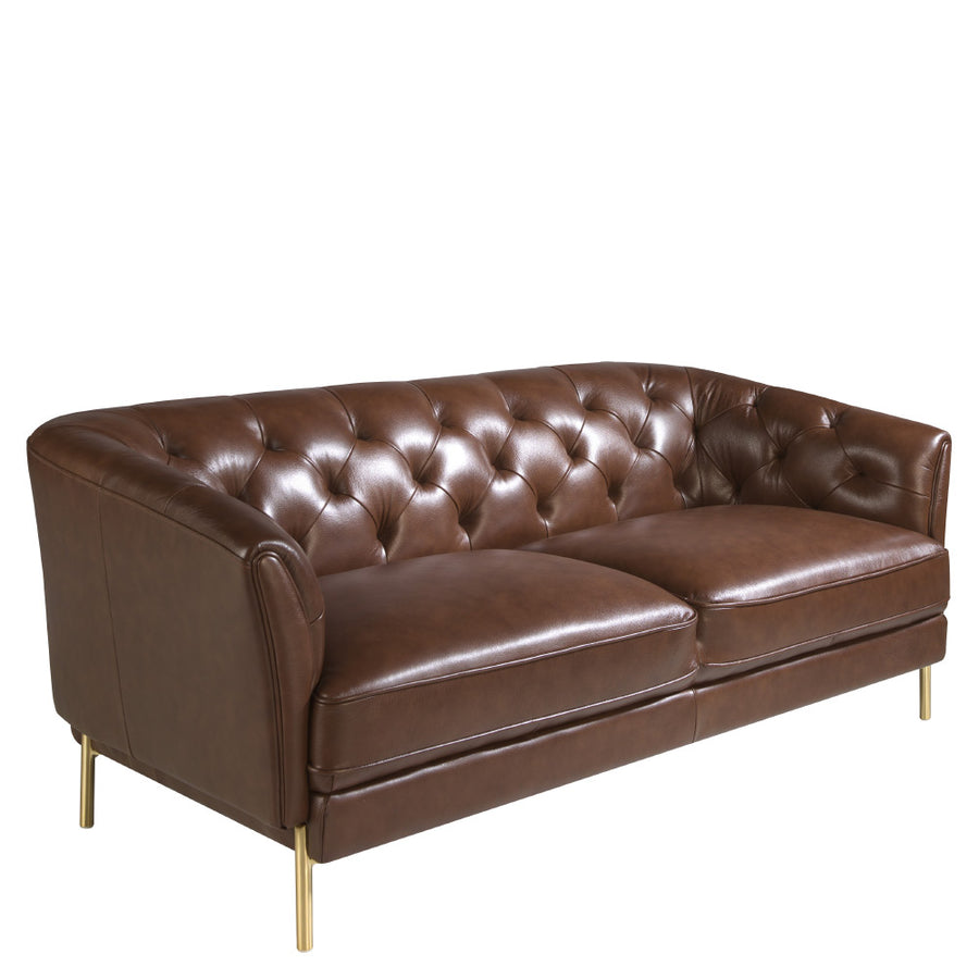 Kortárs stílusú, konyakszínű bőrrel kárpitozott, dizájn kanapé aranyszínű lábakkal.