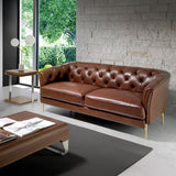 Angel Cerdá modern Chesterfield bőr kanapé nappali enteriőrben
