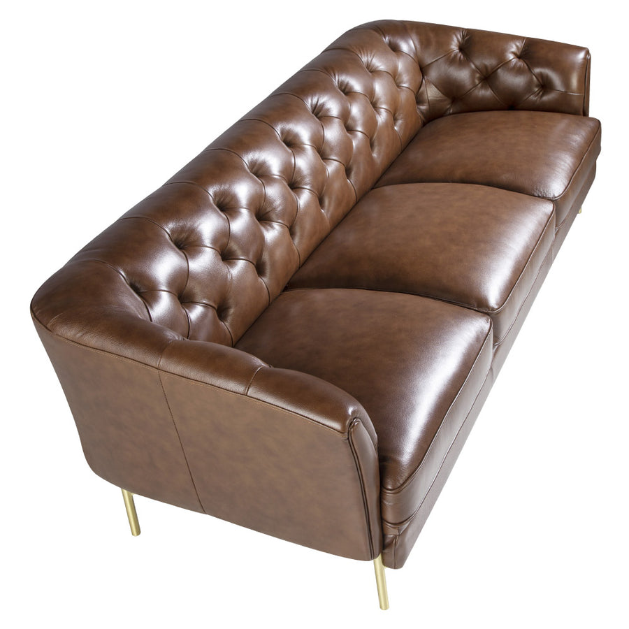 Kortárs stílusú, konyakszínű bőrrel kárpitozott, dizájn kanapé aranyszínű lábakkal.