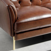 Angel Cerdá konyakbarna bőr kanapé ülőfelület és arany láb részlet